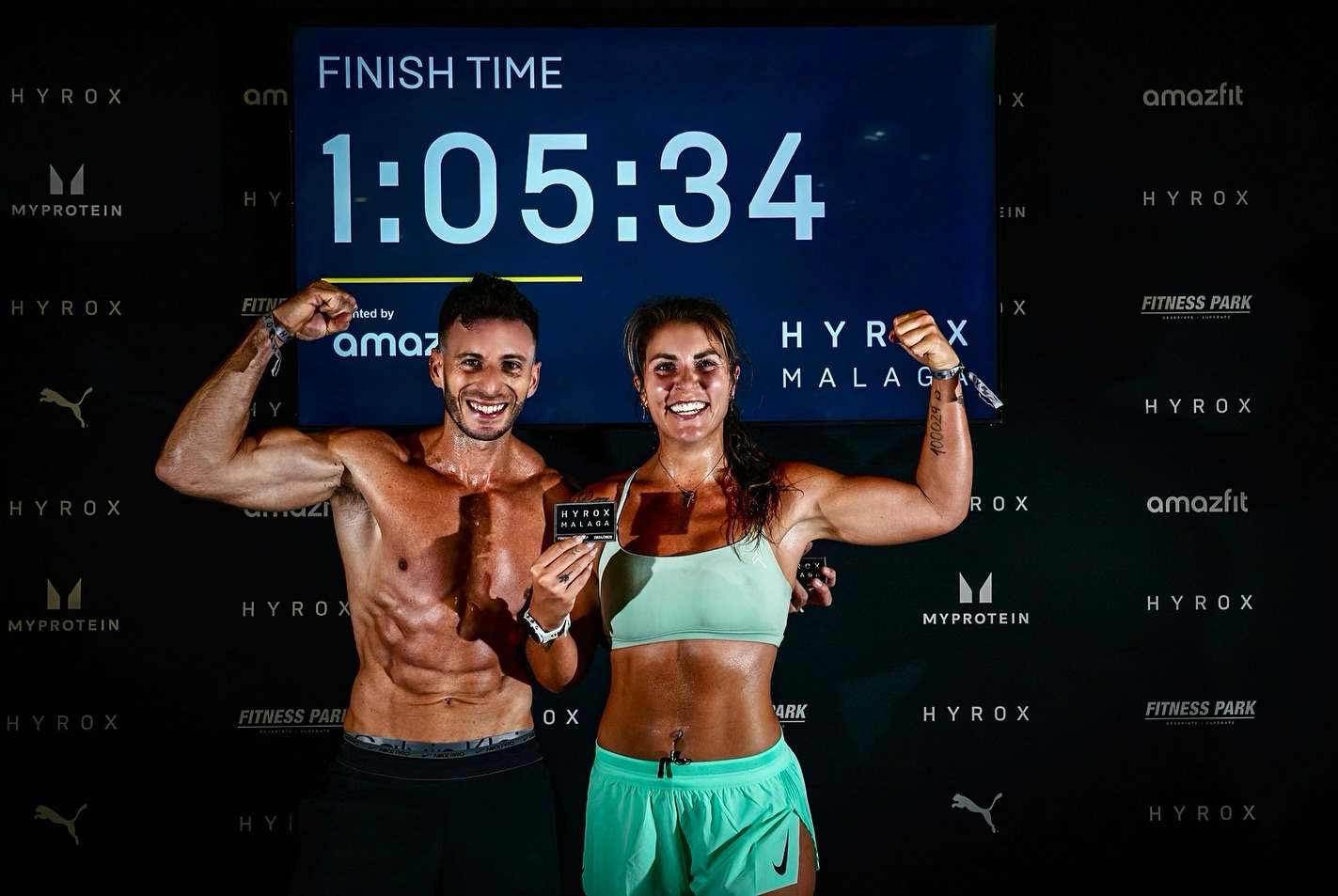 Athletes celebrating their Hyrox finish time